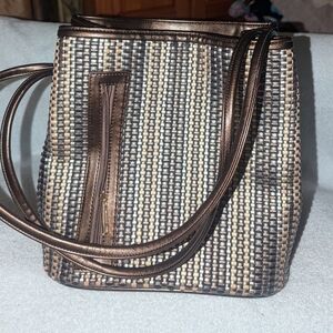 Samoe woven leather convertible satchel.